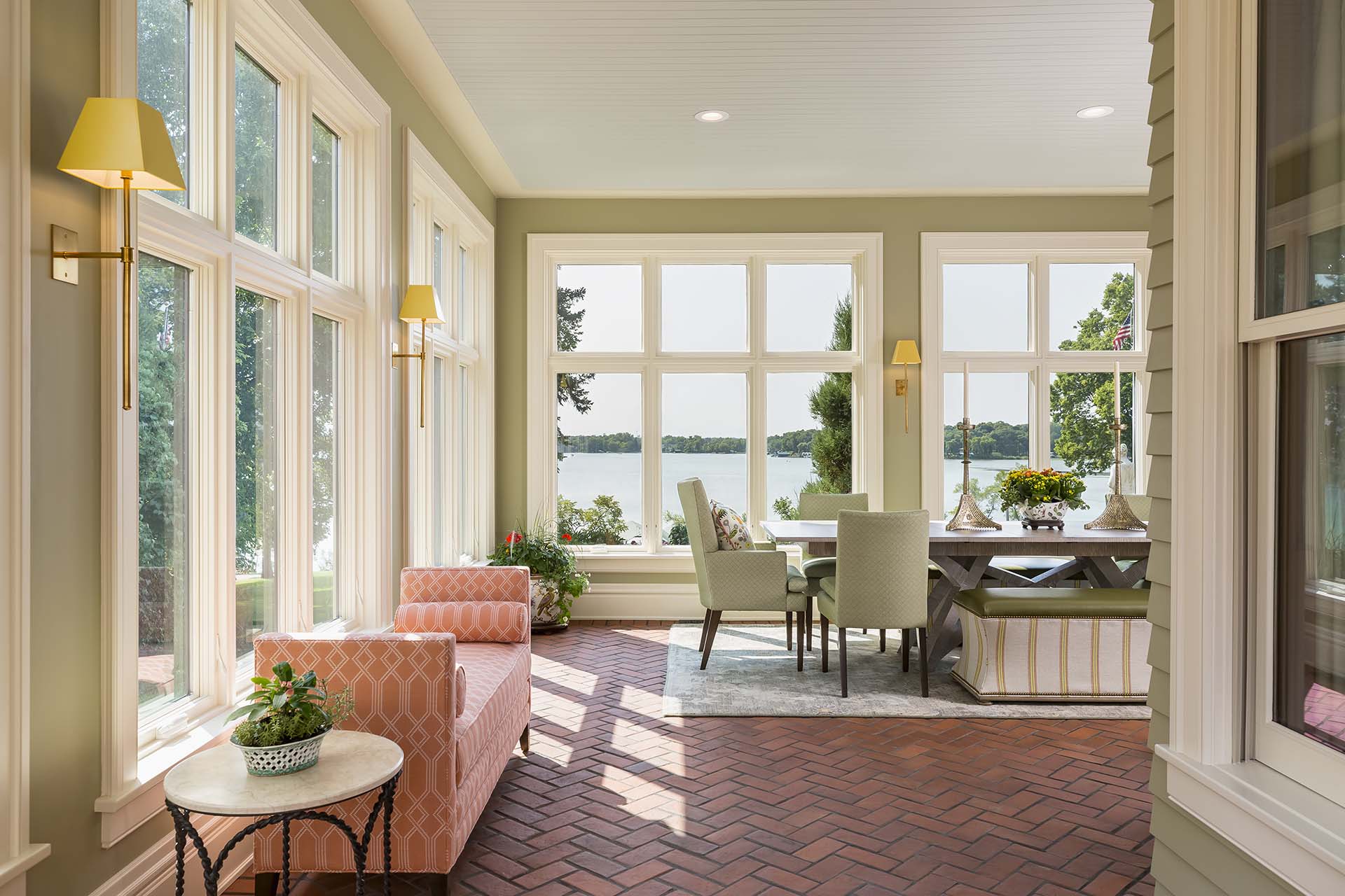 Four season porch with heated brick floors and views of the lake